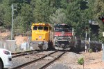 UP 1996 Heritage unit working as rear DPU passing work train at Colfax